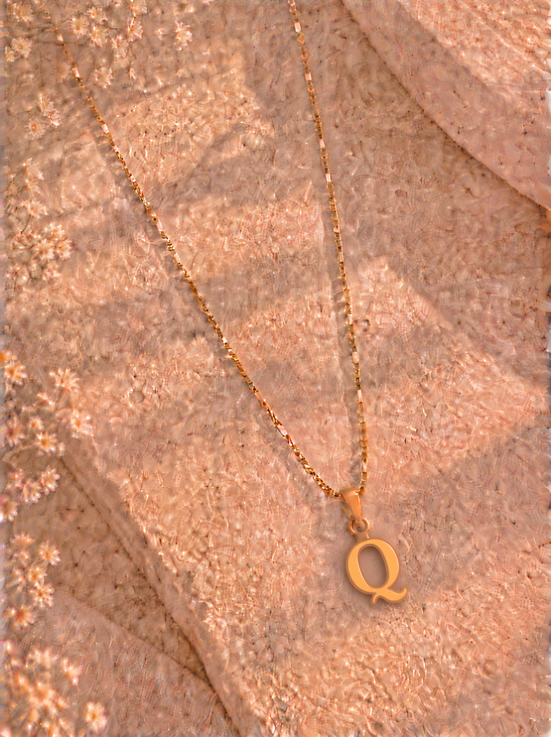 Colgante con inicial Q en oro